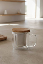 Gustave 300ml glass tea infuser in use