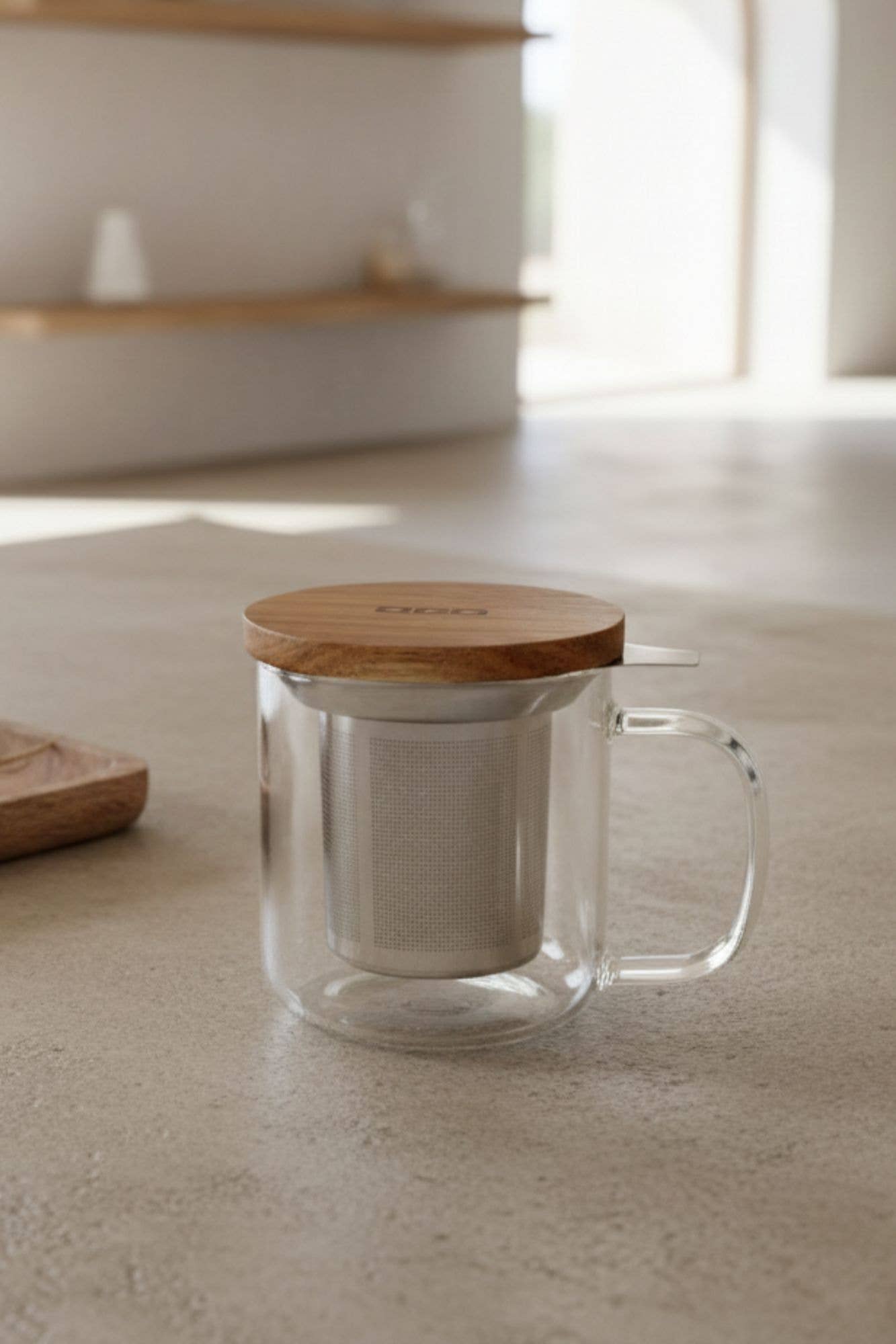 Gustave 300ml glass tea infuser in use