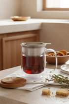 Gustave 350ml double-walled infuser in use